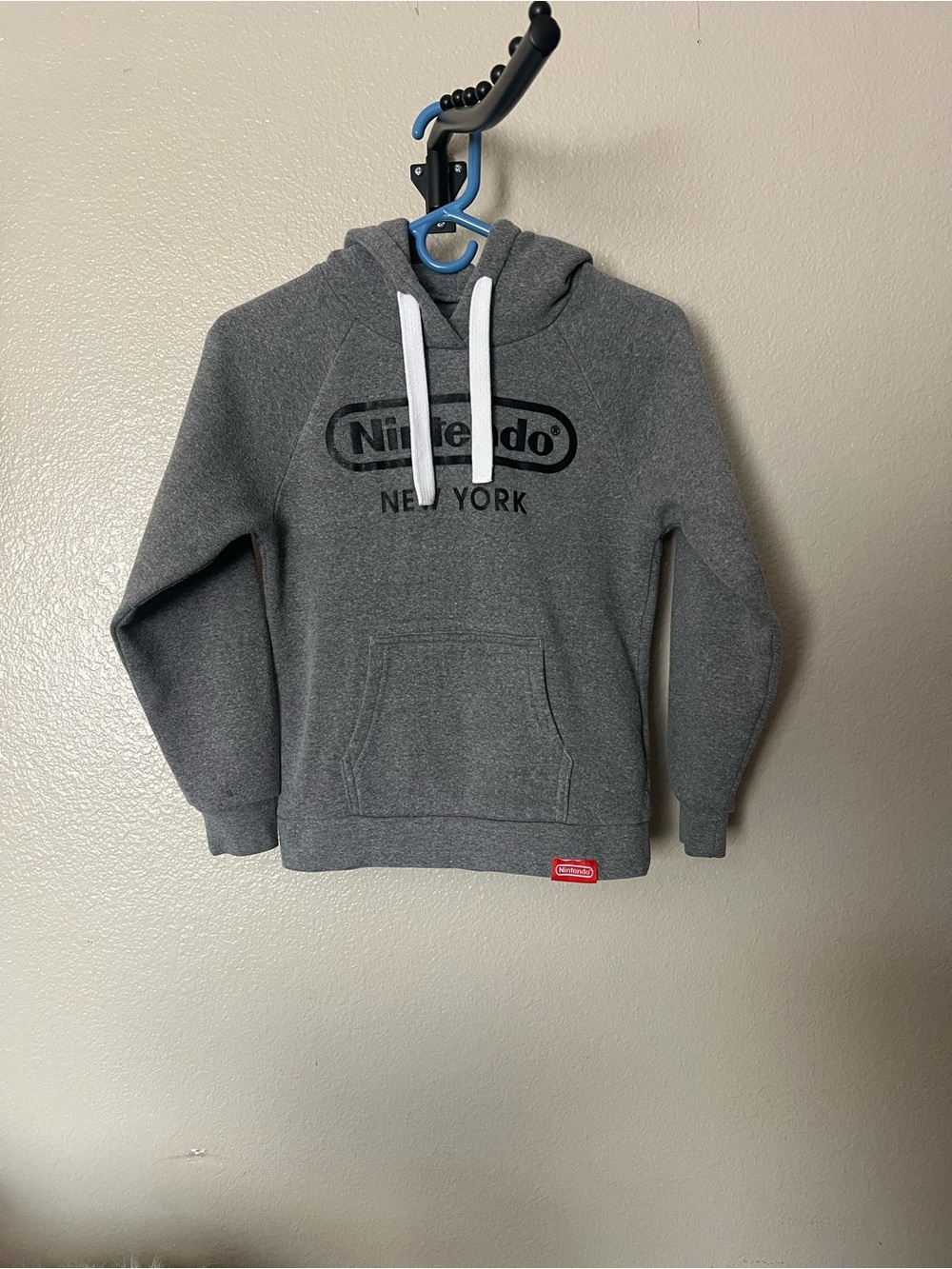 Kids Nintendo New York Heather Gray. Logo Pullover Hoodie with White Drawstrings